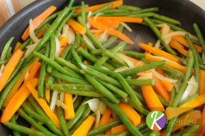 Oignons - Recette de poêlée de légumes haricots verts